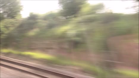 A-passenger-view-of-a-mainline-train-journey-in-England,-United-Kingdom,-from-Retford-to-King's-Cross-Station