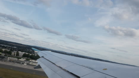Time-lapse-video-of-the-plane-takeoff-from-Düsseldorf-DUS-airport,-view-from-the-side-window-above-wing