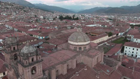 4k-daytime-aerial-drone-footage-over-the-Church-of-the-Society-of-Jesus-from-Plaza-de-Armas-in-Cusco,-Peru-during-Coronavirus-lockdown