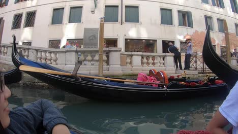 Taking-a-gondola-ride-in-Venice,-Italy-is-a-must-when-you-visit-this-city