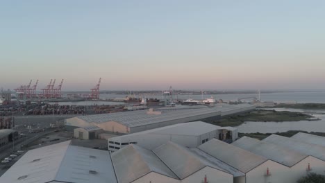 Aerial-orbit-right-view-across-Peel-Port-harbour-distribution-cargo-freight-shipyard