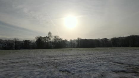 A-drone-flying-low-over-sone-frozen-fields-in-Derbyshire