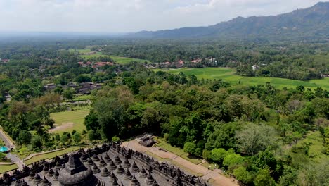 Scenic-aerial-view-of-empty-Borobudur-Temple,-Java,-Indonesia-on-sunny-day