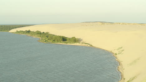 Drone-footage-of-The-great-dune-in-Nida,-Lithuania