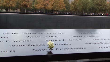 Detail-of-the-names-carved-on-the-National-September-11-Memorial-and-Museum-walls,-in-New-York-City,-USA