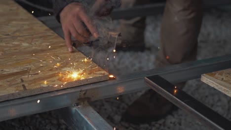 Arc-welding-steel-flooring-fabrication-slow-motion