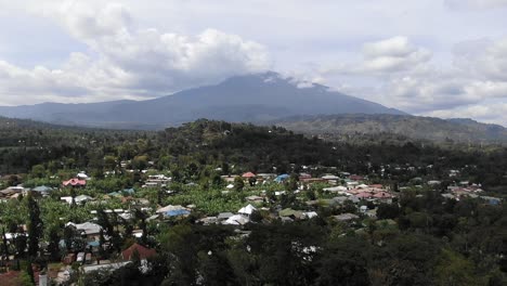 Incredible-Aerial-Shot-Flying-Towards-Mount-Meru-Over-Arusha-Town-Tanzania