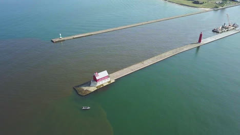 Aerial-view-of-beacon-lighthouse-on-pier-in-Michigan,-USA