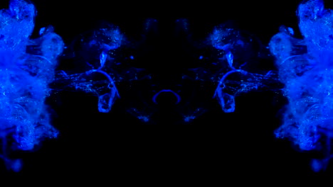 Abstrakte-Bunte-Blaue-Tintentropfen-Spiegelexplosion-Auf-Einem-Dunkelschwarzen-Hintergrund-Mit-Farbmustern-Und-Rauchigen-Effekten