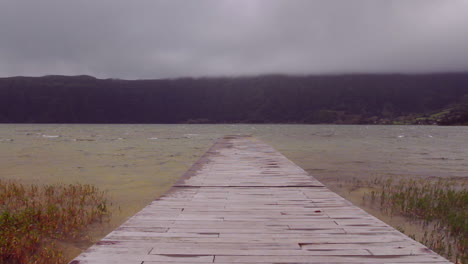 A-small-walking-pier-at-the-lake-of-Sete-Cidades-on-the-island-of-Sao-Miguel-of-the-Portuguese-Azores