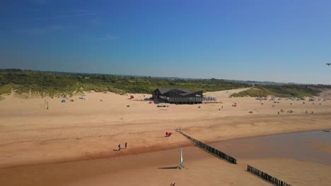 The-beach-of-Cadzand-Bad,-the-Netherlands-during-a-sunny-day