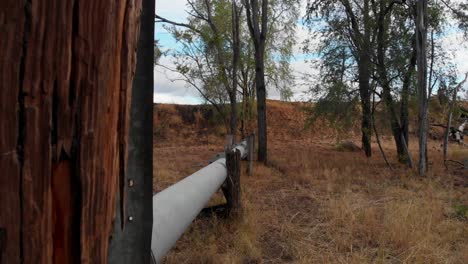 Reveal-shot-of-a-old-pipeline-in-the-outback
