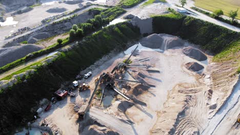 Aerial-shot-from-a-drone-of-quarry-and-heavy-machinery-in-pomeranian-district-in-Poland