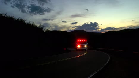 Fire-truck,-ambulance-and-police-car-in-the-dark