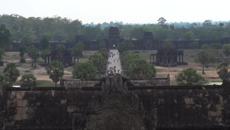 Avenue-to-the-entrance-of-main-temple-in-Angkor-Wat-in-Cambodia,-Asia