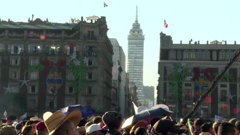 zocalo-at-mexico-city-crowded-on-foreground-and-latin-tower-on-the-background