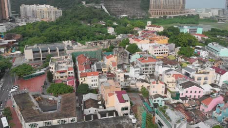 Aerial-drone-shot-over-old-town-tilt-reveal,-Taipa-Village,-Macau