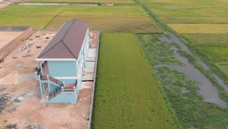 Drone-Shot-of-Building-Construction-in-The-Cambodian-Countryside