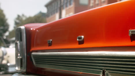 Antique-Ford-Fairlane-rear-end-at-car-show,-Close-Up,-Slide-Left