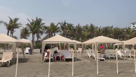 Baldachin-Canopy-on-Sandy-Beach-of-Acapulco-Mexico-and-Beach-Massage,-Copy-Space