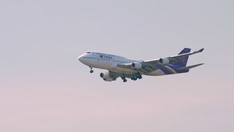 Thai-Airways-Boeing-747-4D7-HS-TGZ-approaching-before-landing-to-Suvarnabhumi-airport-in-Bangkok-at-Thailand