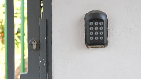 panning-shot-of-alarm-keypad-and-security-gate-in-South-Africa