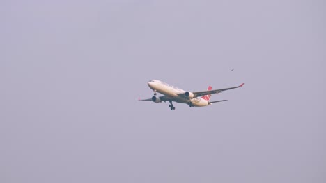 Turkish-Airlines-Airbus-A330-303-TC-JOK-approaching-before-landing-to-Suvarnabhumi-airport-in-Bangkok-at-Thailand