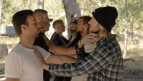 Men-Talking,-Hugging-And-Supporting-Each-Other-In-Men's-Group---Hands-On-Each-Other's-Chests-As-Connection---Manhood-Training---Queensland,-Australia