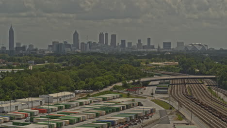 Atlanta-Georgia-Aerial-v661-birdseye-shot-of-freight-train-station,-park-and-skyline---DJI-Inspire-2,-X7,-6k---August-2020