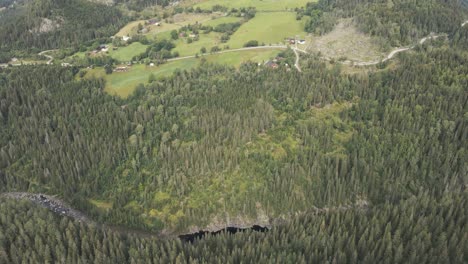 Norwegian-forest,-houses,-river-and-roads