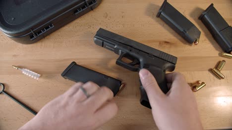 Tabletop-with-Tactical-gear,-unload-Glock-10mm