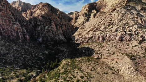 Aerial-pullback-shot-of-mountains-at-Red-Rock-Canyon-Park-in-Nevada