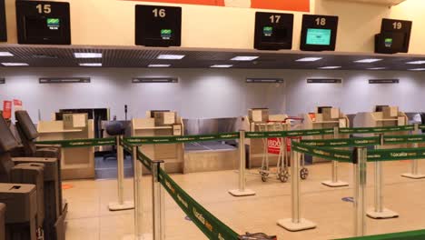 Self-help-machines-of-the-air-company-GOL-in-the-city-airport-Santos-Dumont-in-Rio-de-Janeiro-panning-to-empty-check-in-and-baggage-drop-off-points