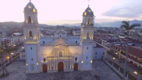 Aerial-view-with-drone-of-the-sunrice-over-main-church-of-the-Cordoba-city,-Veracruz,-Mexico