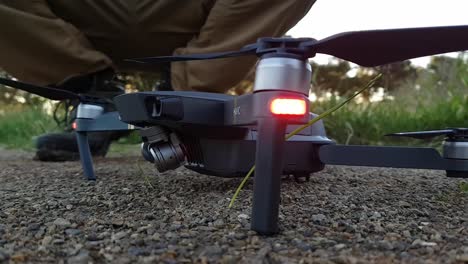 Professional-videography-drone-calibrating-camera-gimbal-on-the-ground-before-take-off
