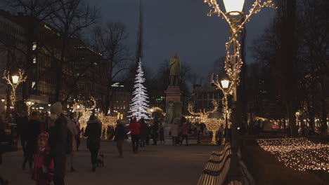 Christmas-decoration-around-the-statue-of-Johan-Ludvig-Runeberg-in-Helsinki-at-night