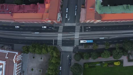 Helsinki-quiet-street-from-above-with-bus-passing-and-treetops
