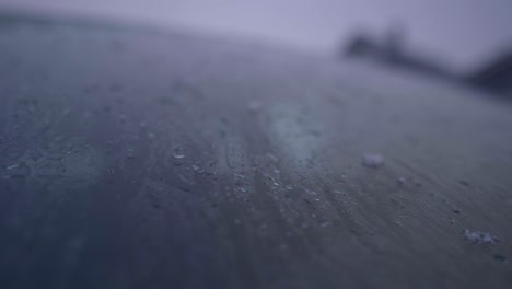 Drops-Of-Melting-Snow-On-Car-Window-Glass---Closeup-Shot