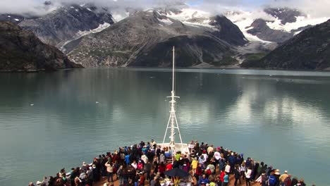 Cruise-ship-in-Glacier-Bay-National-Park-Alaska,-tourists-enjoying-the-landscape