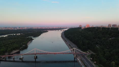 Aerial-shot-of-the-Dnipro-river-through-the-city-of-Kiev