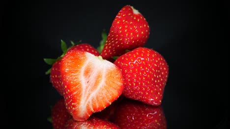 Seasonal-fruity-eco-strawberries-bunch-on-turntable