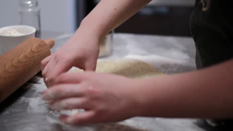 Preparing-the-dough-for-sweet-desserts-in-patisserie-kitchen-behind-the-scenes