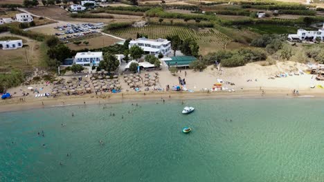 Tourists-enjoy-Golden-Beach-on-the-greek-island-of-Paros
