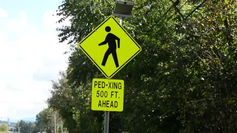 Pedestrian-crossing-sign-with-flashing-lights