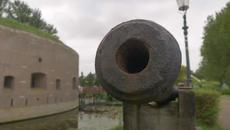 A-Close-up-Shot-of-an-Old-Cannon,-on-a-School-Trip-to-a-World-Heritage-Site,-Amsterdam