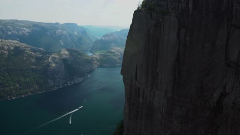 Epic-view-down-from-Preikestolen-edge-in-to-the-abyss-of-Pulpit-Rock-in-Norway