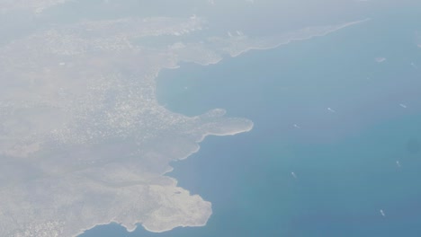 Stunning-aerial-shot-of-Athens-and-ships-travelling-to-port