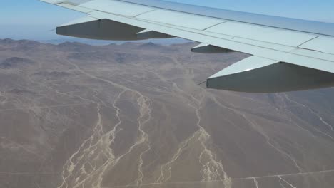 A-shot-from-a-plane-flying-over-the-Andes-mountains-and-the-Atacama-desert