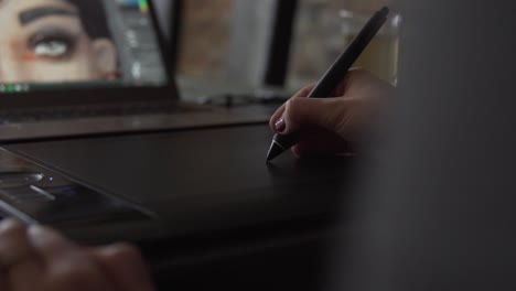 SLOW-MOTION:-Female-Graphic-Designer-working-with-tablet-and-digital-pen