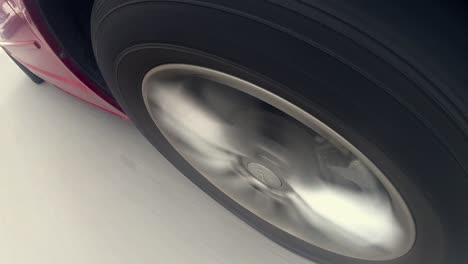 Close-up-of-tire-on-road,-perfect-for-road-trip-projects